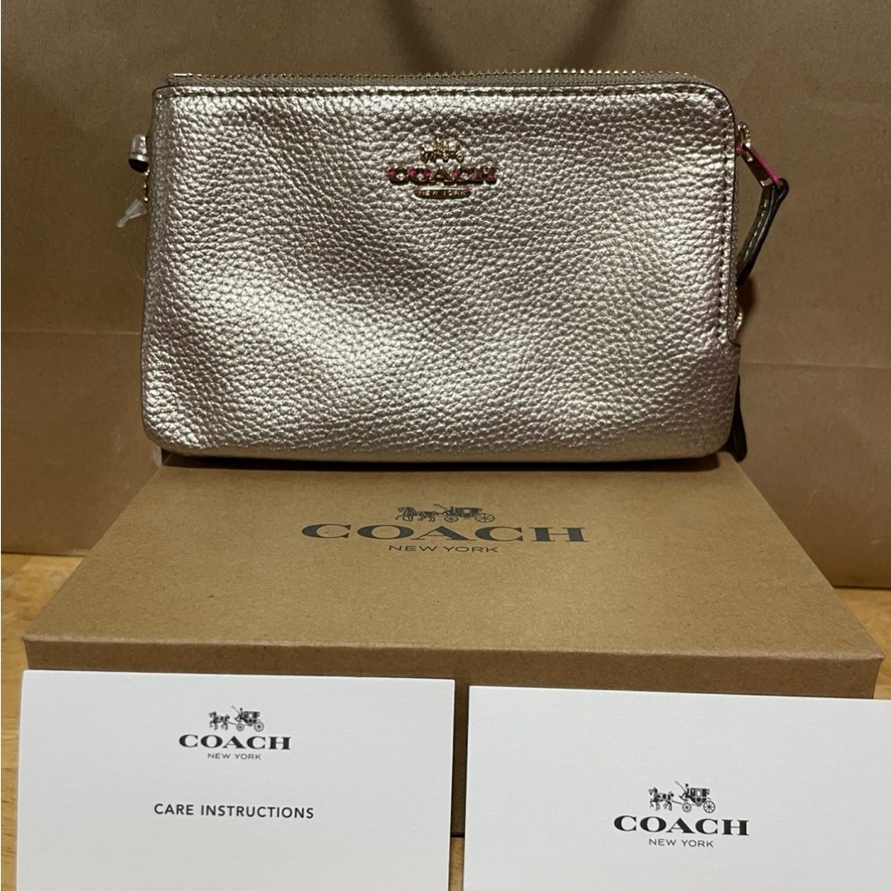 Coach Gold Clutch Wristlet with Luxurious Finish
